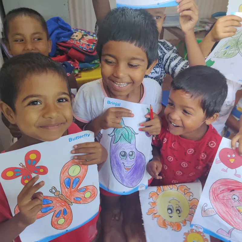 Children colouring at a Pure Hearts activity